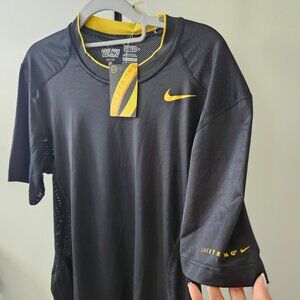 NIKE. T-SHIRT. Size M, Color  Black with yellow accents. NWT